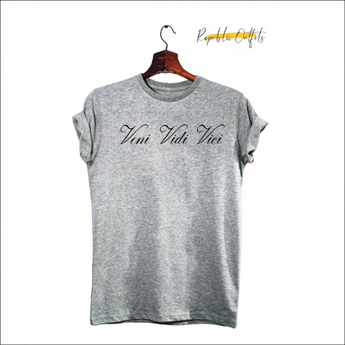 Gray t-shirt with 'Veni Vidi Vici' text on a hanger against a white background